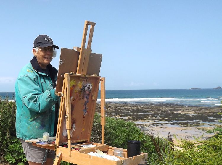 Melanie painting on location at Constantine Bay